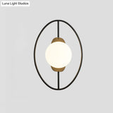 Minimalist Metal Halo Ring Sconce Lighting With Black/Gold Finish Orb White Glass Shade