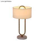 Minimalist White Drum Night Table Lamp With Brass Oval Stand - 1 Bulb Fabric Nightstand Light