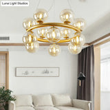Modern 12-Bulb Gold Chandelier With Clear Glass Shade - Stylish Globe Suspension Light
