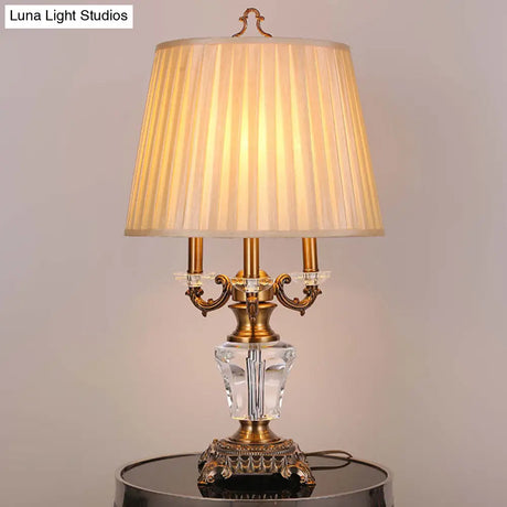 Modern Beige Fabric Pleated Desk Lamp With Bronze Sculpted Metal Base - 1 Bulb