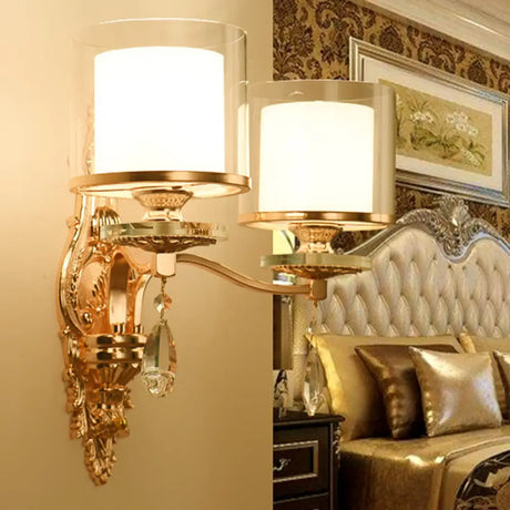 Modern Dual Cylinder 2-Light Gold Wall Sconce With Clear And Frosted Glass