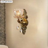 Modern Floral Shaped Wall Sconce Light With Amber Glass And Teardrop Crystal Drop In Brass - 1/2