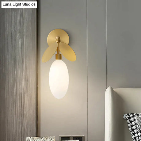 Modern Globe/Oval Wall Mount Lamp With Cream Glass - Brass Bedside Light Leaf Deco