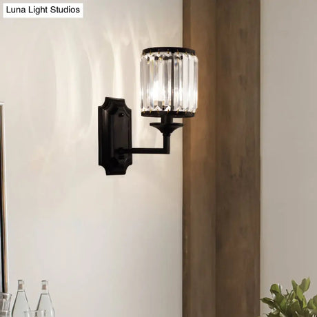 Modern Metallic Cylinder Wall Lamp: 1 Light Sconce With Clear Crystal Prism In Black For Corridor