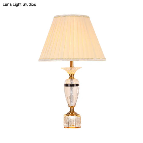 Modern Urn Shape Fabric Desk Light - Faceted Crystal 1 Bulb Night Table Lamp In Beige
