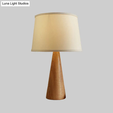 Modern White Nightstand Lamp With Shaded Fabric Table Light And Conical Brown Wood Base