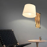 Modern Wood Expansion Arm Sconce With White Fabric Shade