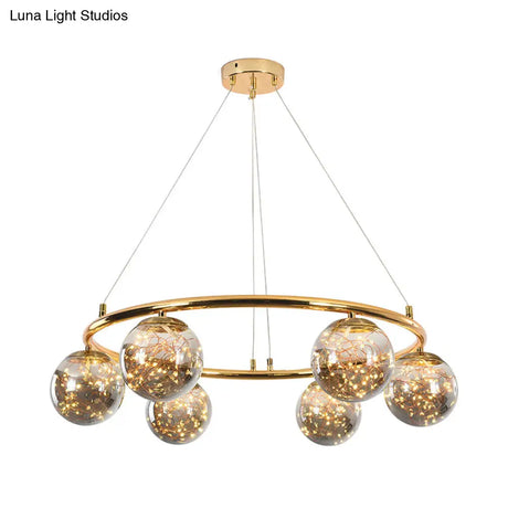 Modernist Smoke Gray Glass Ball Chandelier - 6 Head Brass Ring Pendant Light With Unique Glowworm