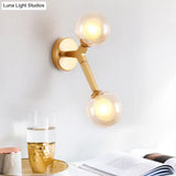 Novelty Amber Glass Wall Light Fixture With Rotatable Tree Crotch Accent - Modern 2-Bulb Gold Sconce