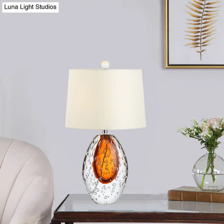 Oval Desk Lamp With Clear Bubble Glass Ideal For Bedroom Or Night Table Modern Design In White
