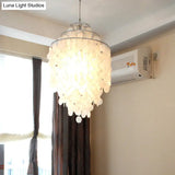 Retro Shell Silver Pendant Lighting For Tiered Dining Rooms