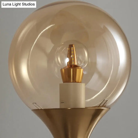 Retro Style Amber Glass Wall Sconce - Single Closed Ball Fixture