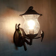 Rustic Black Gourd Shaped Garden Wall Lamp - 1-Light Seedy Glass Lantern Sconce With Charming Bird