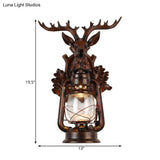 Rustic Elk Backplate Wall Lamp - Flameless Kerosene Sconce With Brown/Bronze Glass
