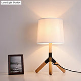 Simplicity Wood Tri-Leg Table Lamp With 1 Light And White Barrel Fabric Shade - Perfect For