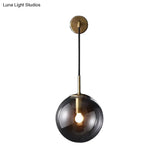 Smoked Glass Sconce Light: Modern Wall Lighting Fixture With 1 Bulb In Black/Brass 8/10 - Ideal For