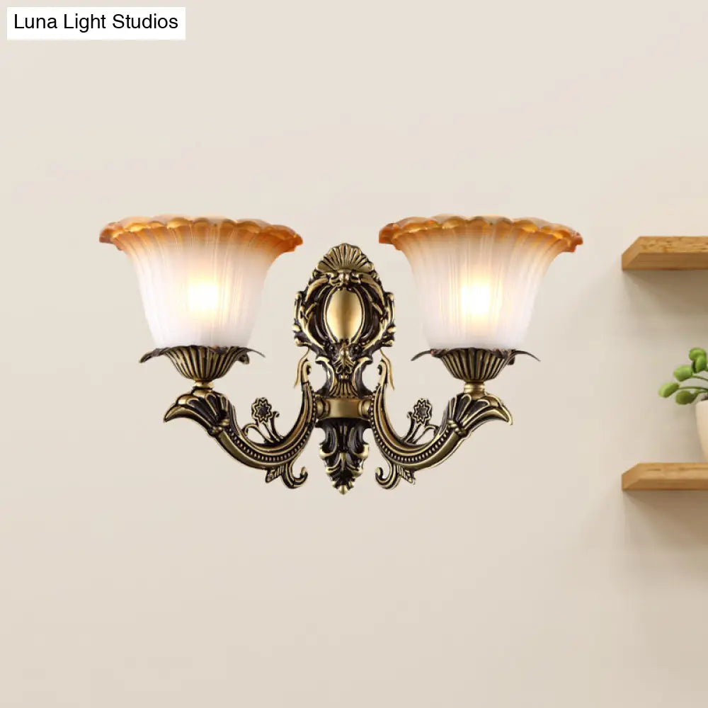 Vintage Floral Wall Sconce With Frosted Glass And Carved Brass Arm