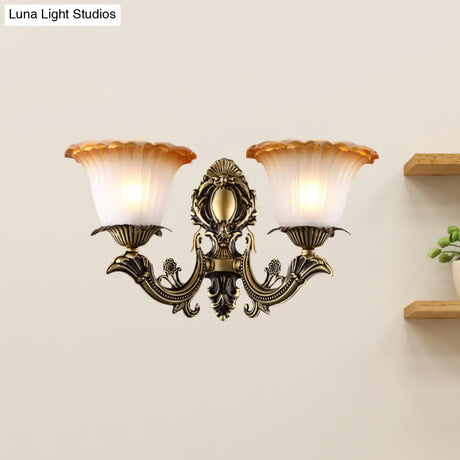 Vintage Floral Wall Sconce With Frosted Glass And Carved Brass Arm