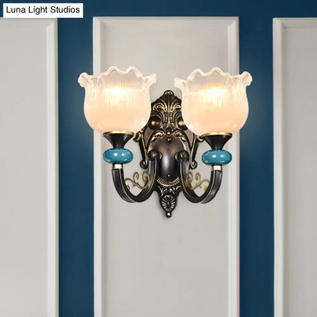 Vintage Floral Wall Sconce With Frosted Glass Shade - Bronze Metal Curvy Arm Bedroom Décor