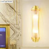 Vintage Gold Cylinder Wall Sconce With Clear Glass And Dual Led Lights For Bedroom