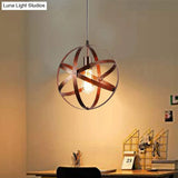 Vintage Industrial Pendant Light With Single Globe Cage For Dining Table