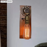 Vintage Metallic Wall Lamp With Aged Brass Sconce And Open Bulb For Living Room