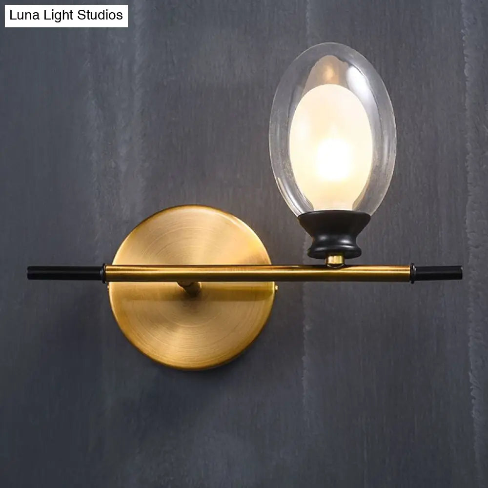 Vintage Oval Wall Sconce With 1 Clear Glass Light - Bedroom Mounted Lamp Featuring Brass Bar