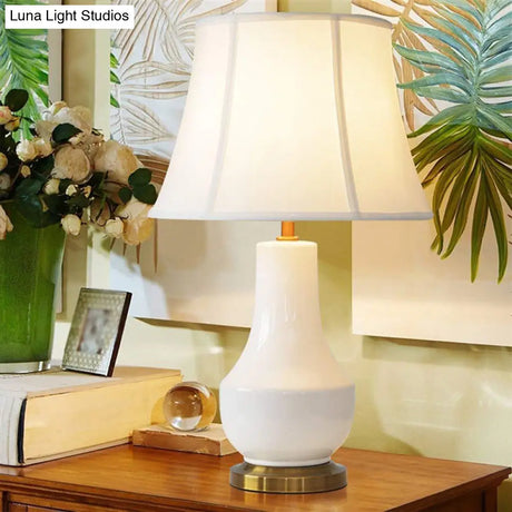 White Modern Bell Shape Desk Lamp With Ceramic Base - Fabric Shade 1 Bulb Table Light